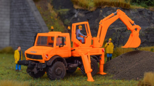 Kibri 18480 H0 UNIMOG mit Aufbaubagger